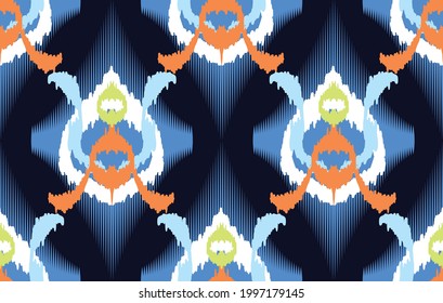 Ikat ethnic Indian seamless pattern design. Aztec fabric carpet mandala ornament boho chevron textile decoration. Geometric African American style traditional embroidery vector illustrations backgroun
