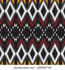 Ikat ethnic Indian seamless pattern design. Ikat Zigzag pattern seamless. Geometric chevron abstract illustration, wallpaper. Tribal ethnic vector texture. Ikat Aztec style. Folk embroidery. Indian,