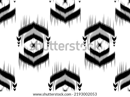Ikat Ethnic Indian Seamless Pattern Design Aztec Fabric Carpet Mandala Ornament Native American African Textile Chevron Wallpaper. Geometric boho texture vector illustration background white gray blac