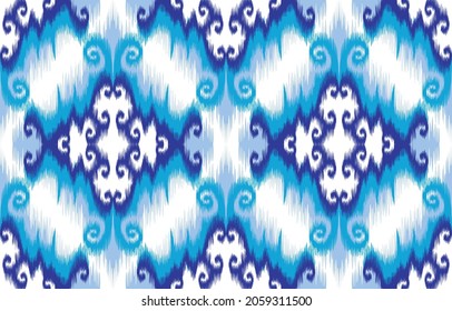 Diseño de patrones étnicos Ikat. Moqueta de tela azteca mandala adorno boho chevron decoración textil papel de pared. Antecedentes de los vectores orientales del bordado tradicional indígena tribal de pavo africano