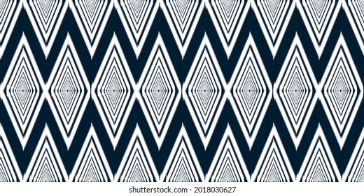 Ikat ethnic pattern. Geometric folk ornament.tribal seamless pattern for fabric,cloth,wallpaper,wallet. Aztec pattern,Indian,Scandinavian,Gypsy.