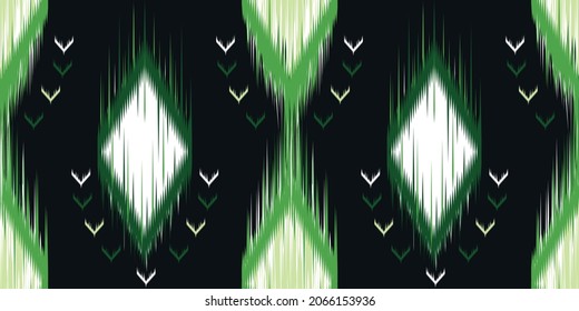 Ikat ethnic seamless pattern. Abstract background for textile design, wallpaper, surface textures, Boho style,carpet,clothing,wrapping,Batik,fabric,sarong,Vector illustration embroidery style. EPS 10.
