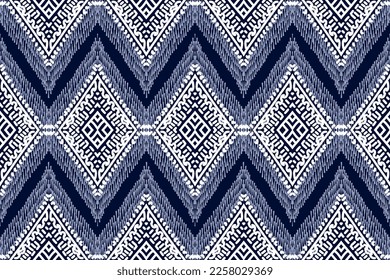 Ikat ethnic seamless pattern. Abstract ogee textured background for textile, wallpaper, carpet, clothing. Traditional bohemian vector illustration! Design for printing business.