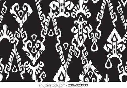 Ikat ethnic seamless pattern. Abstract vector native and ikat geometric pattern design for textile, wallpaper, carpet, clothing,decorative and illustration
