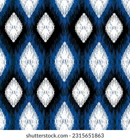ikat ethnic seamless pattern. abstract ogee textured background for textile, wallpaper