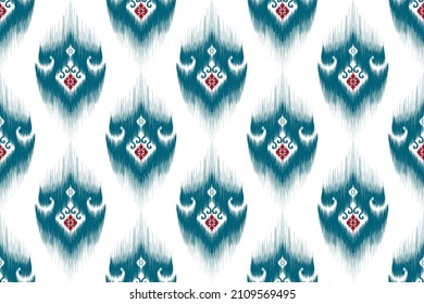 Diseño de patrones sin fisuras de la etnia Ikat. Moqueta de tela azteca mandala ornamental chevron decoración textil papel tapiz. Antecedentes de los vectores tradicionales de bordado de la India africana de Turquía 