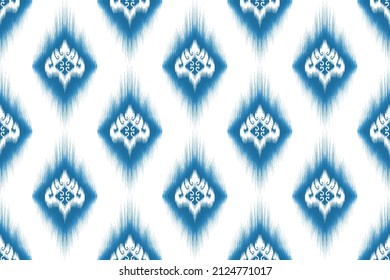 Ikat ethnic seamless pattern design. Aztec fabric carpet mandala boho chevron textile decoration wallpaper. Native tribal turkey African Indian traditional embroidery vector illustrations background