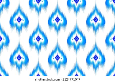 Ikat ethnic seamless pattern design. Aztec fabric carpet mandala boho chevron textile decoration wallpaper. Native tribal turkey African Indian traditional embroidery vector illustrations background