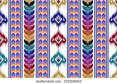 Diseño de patrones sin fisuras de la etnia Ikat. Alfombra de tela azteca mandala adornos de decoración textil étnica papel de pared. Resumen del vector de bordado tradicional de la tribu geométrica boho nativa de la etnia turca