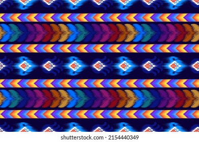 Ikat ethnic seamless pattern design. Aztec fabric carpet mandala abstract ornaments textile ethnic decorations wallpaper. Tribal boho native ethnic turkey traditional embroidery vector background 