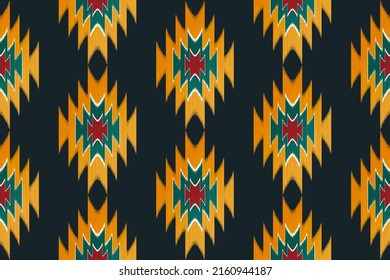 Ikat ethnic seamless pattern design. Abstract Aztec fabric carpet mandala ornaments ethnic textile decorations wallpaper. Tribal boho native ethnic turkey traditional embroidery vector background 