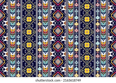 Ikat ethnic seamless pattern design. Tribal boho native ethnic turkey traditional embroidery vector background. Abstract Aztec fabric carpet mandala ornaments ethnic textile decorations wallpaper 