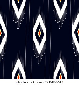 Ikat ethnic seamless pattern design. Aztec fabric carpet mandala ornament native boho chevron textile decoration. Geometric embroidery patterns vector illustrations background.