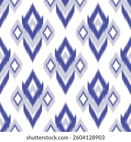 Ikat ethnic seamless pattern for textile, fabric, clothing, printing, paper, wallpaper, backdrop, cover, wrapping, decoration.