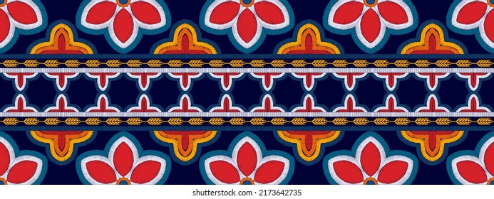 Diseño de patrones sin fisuras de la etnia Ikat. Vector de bordado tradicional de pavo textil de origen boho tribal. Moqueta de tela azteca adornos de mandala decoraciones textiles abstractas papel tapiz 