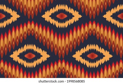 Ikat ethnic zigzag abstract background. Seamless pattern in tribal, folk embroidery, Ikat art design. Aztec geometric art ornament print.Design for carpet, wallpaper, clothing, wrapping, fabric, cover