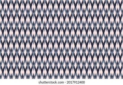 Antecedentes de diseño de la etnia ikat zigzag. Patrón de ikat sin foco en el arte tribal de color azul bordado folclórico. Dibujo de arte geométrico azteca con adorno.Diseño de alfombras, papel pintado, ropa, envoltura, tela.