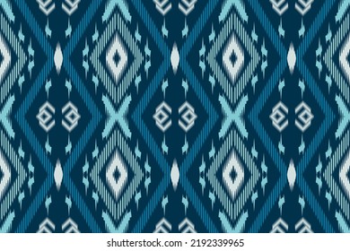 Ikat ethnic zigzag design background. Simple ikat motifs abstract tribal Aztec art Design for background,carpet,wallpaper,clothing,wrapping,Batik,fabric,Vector illustration. embroidery style.