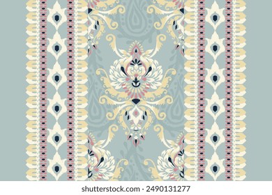 Ikat floral paisley design pattern on blue background.Ikat ethnic oriental embroidery traditional,Aztec style,abstract background,vector illustration.design for texture,fabric,clothing,decoration.