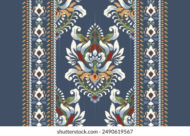 Ikat floral paisley design pattern on navy blue background.Ikat ethnic oriental embroidery traditional,Aztec style,abstract background,vector illustration.design for texture,fabric,clothing,decoration