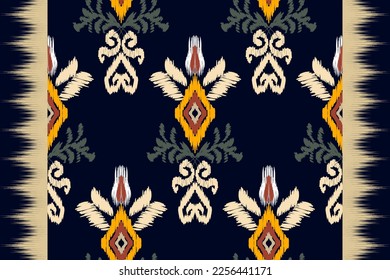 Ikat Floral Paisley Embroidery on Dark Blue Background Traditional geometric ethnic pattern, Aztec style abstract vector illustration, designed for