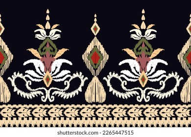 Ikat floral paisley embroidery on black background.geometric ethnic oriental pattern traditional.Aztec style abstract vector illustration.design for 