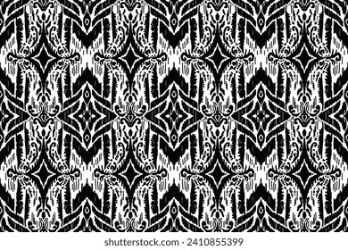 Ikat floral paisley embroidery on white background.Ikat ethnic oriental seamless pattern traditional.Aztec style abstract vector illustration. perfect for texture,fabric,clothing,wrapping,decoration.
