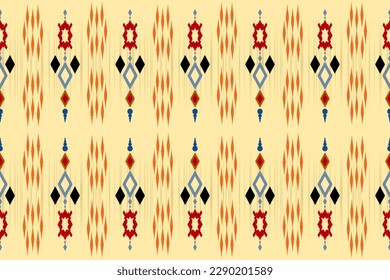 Ikat floral paisley embroidery seamless  on background. Ikat ethnic oriental pattern traditional. Aztec style abstract vector illustration. design for fashion texture,fabric,clothing,wrapping.