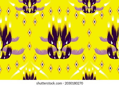 ikat geometric ethnic pattern oriental traditional design. tribal abstract embroidery style on yellow backgroud comprises leaf, triangle and round shapes. Seamless vector illustration.