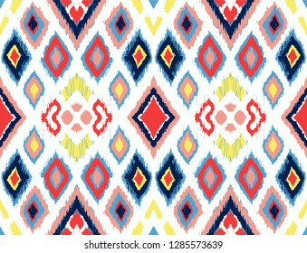 Ikat geometric folklore ornament with diamonds. Tribal ethnic vector texture. Seamless striped pattern in Aztec style. Folk  embroidery. Indian, Scandinavian, Gypsy, Mexican, African rug. 