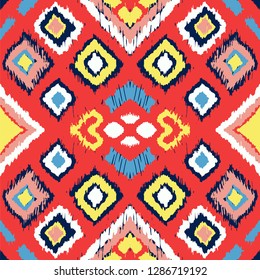 Ikat geometric folklore ornament with diamonds. Tribal ethnic vector texture. Seamless striped pattern in Aztec style. Folk embroidery. Indian, Scandinavian, Gypsy, Mexican, African rug.
