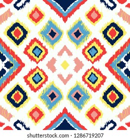 Ikat geometric folklore ornament with diamonds. Tribal ethnic vector texture. Seamless striped pattern in Aztec style. Folk embroidery. Indian, Scandinavian, Gypsy, Mexican, African rug.
