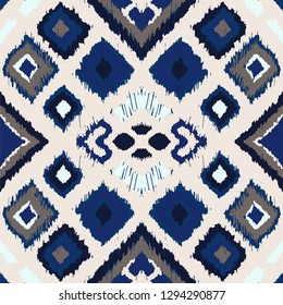Ikat geometric folklore ornament with diamonds. Tribal ethnic vector texture. Seamless striped pattern in Aztec style. Folk  embroidery. Indian, Scandinavian, Gypsy, Mexican, African rug. 