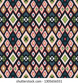 Ikat geometric folklore ornament with diamonds. Tribal ethnic vector texture. Seamless striped pattern in Aztec style. Folk  embroidery. Indian, Scandinavian, Gypsy, Mexican, African rug. 