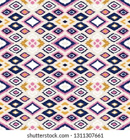Ikat geometric folklore ornament with diamonds. Tribal ethnic vector texture. Seamless striped pattern in Aztec style. Folk  embroidery. Indian, Scandinavian, Gypsy, Mexican, African rug. 