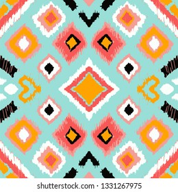 Ikat geometric folklore ornament with diamonds. Tribal ethnic vector texture. Seamless striped pattern in Aztec style. Folk  embroidery. Indian, Scandinavian, Gypsy, Mexican, African rug. 