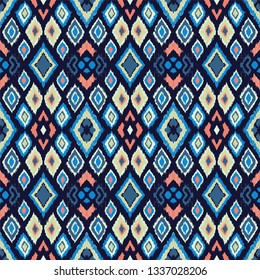 Ikat geometric folklore ornament with diamonds. Tribal ethnic vector texture. Seamless striped pattern in Aztec style. Folk  embroidery. Indian, Scandinavian, Gypsy, Mexican, African rug. 