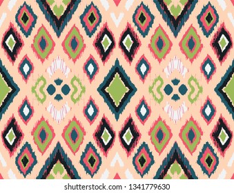 Ikat geometric folklore ornament with diamonds. Tribal ethnic vector texture. Seamless striped pattern in Aztec style. Folk  embroidery. Indian, Scandinavian, Gypsy, Mexican, African rug. 