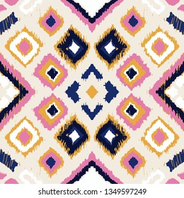 Ikat geometric folklore ornament with diamonds. Tribal ethnic vector texture. Seamless striped pattern in Aztec style. Folk  embroidery. Indian, Scandinavian, Gypsy, Mexican, African rug. 