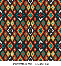Ikat geometric folklore ornament with diamonds. Tribal ethnic vector texture. Seamless striped pattern in Aztec style. Folk  embroidery. Indian, Scandinavian, Gypsy, Mexican, African rug. 