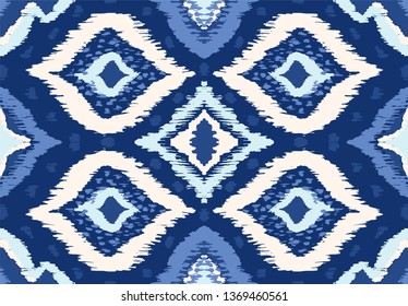 Ikat geometric folklore ornament with diamonds. Tribal ethnic vector texture. Seamless striped pattern in Aztec style. Folk  embroidery. Indian, Scandinavian, Gypsy, Mexican, African rug. 