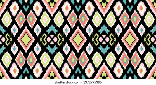 Ikat geometric folklore ornament with diamonds. Tribal ethnic vector texture. Seamless striped pattern in Aztec style. Folk  embroidery. Indian, Scandinavian, Gypsy, Mexican, African rug. 