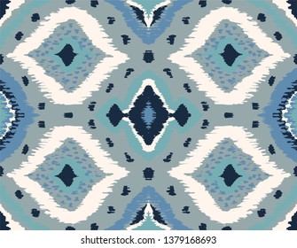 Ikat geometric folklore ornament with diamonds. Tribal ethnic vector texture. Seamless striped pattern in Aztec style. Folk  embroidery. Indian, Scandinavian, Gypsy, Mexican, African rug. 