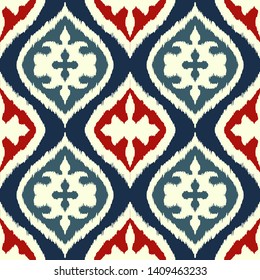 Ikat geometric folklore ornament with diamonds. Damask rug. Tribal ethnic vector texture. Persian geo print. Seamless pattern in Aztec style. Folk embroidery. Gypsy, Mexican, African print.