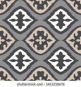 Ikat geometric folklore ornament with diamonds. Damask rug. Tribal ethnic vector texture. Persian geo print. Seamless pattern in Aztec style. Folk embroidery. Gypsy, Mexican, African print.
