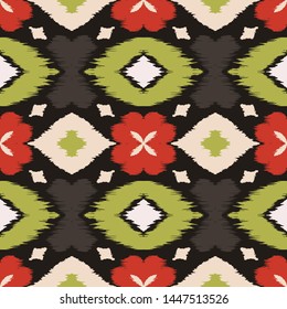 Ikat geometric folklore ornament with diamonds and flowers. African rug. Tribal ethnic vector texture. Seamless pattern in Aztec style. Folk embroidery. Indian batik. Mexican decor.