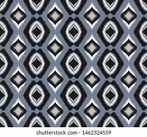 Ikat geometric folklore ornament with diamonds. Tribal ethnic vector texture.