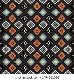 Ikat geometric folklore ornament with diamonds. Tribal ethnic vector texture. Seamless striped pattern in Aztec style. Folk embroidery. Indian, Scandinavian, Gypsy, Mexican, African rug.