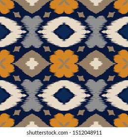 Ikat geometric folklore ornament with diamonds and flowers. African rug. Tribal ethnic vector texture. Seamless pattern in Aztec style. Folk embroidery. Indian batik. Mexican decor.