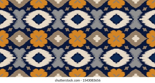 Ikat geometric folklore ornament with diamonds and flowers. African rug. Tribal ethnic vector texture. Seamless pattern in Aztec style. Folk embroidery. Indian batik. Mexican decor.